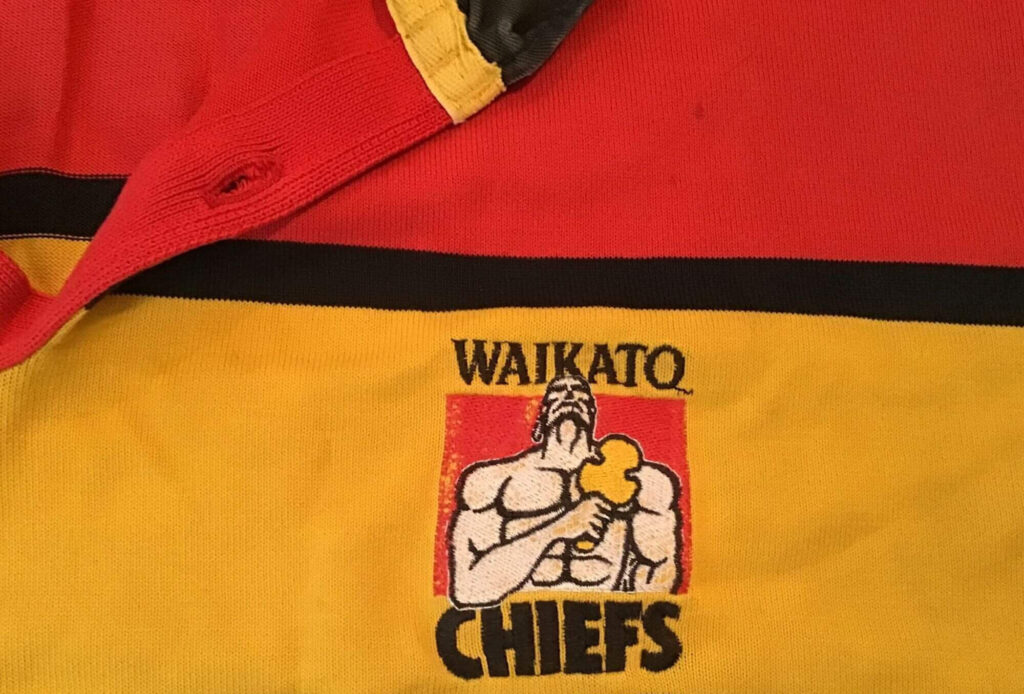 The original Chiefs logo designed in 1996 by Dave Clark Design, as seen on a replica jersey.